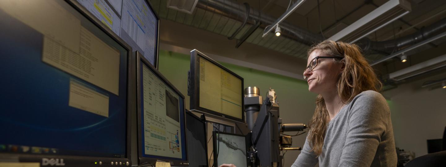 A person uses an Electron Microprobe.